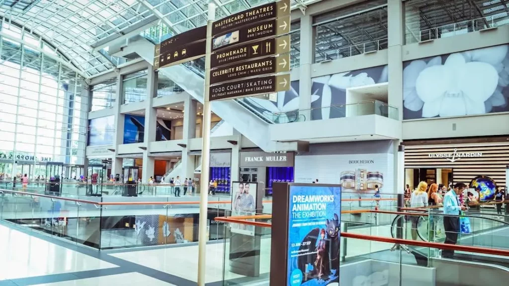 Vibrant interior of Singapore mall showcasing modern architecture and guest experience in event venues.